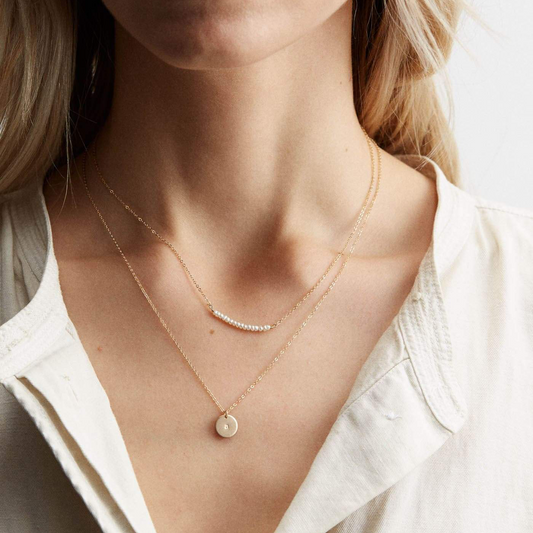 Paauksuotaa grandinėlė su natūraliais perlais