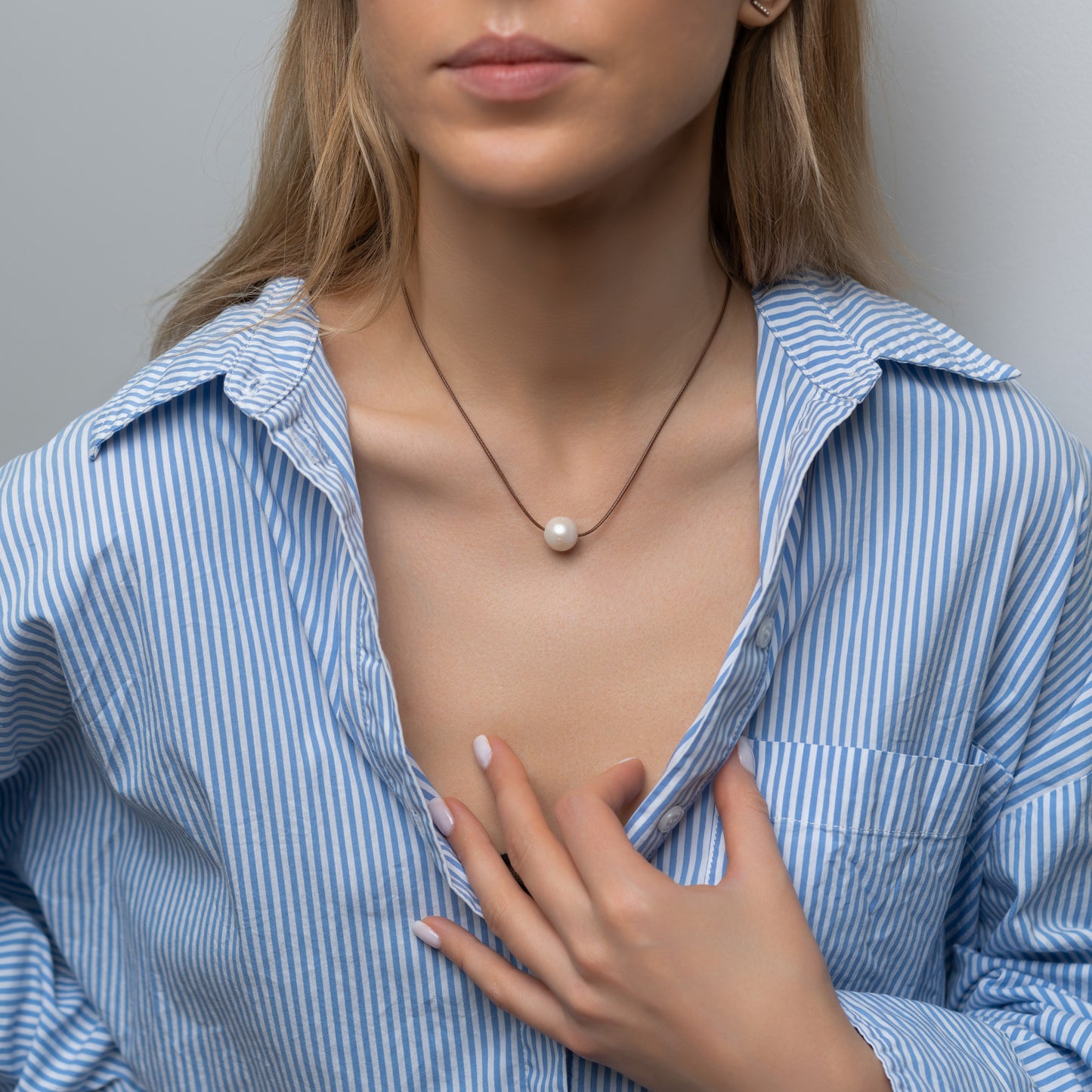 Nahast kaelakee pärliga