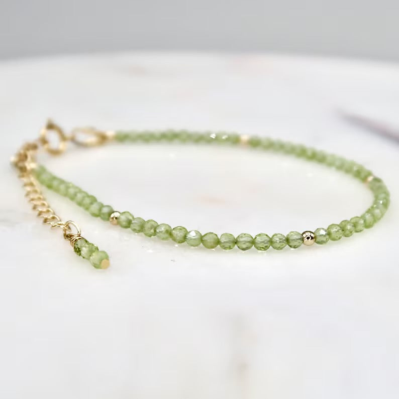 Quartz bracelet with gold plated / silver details