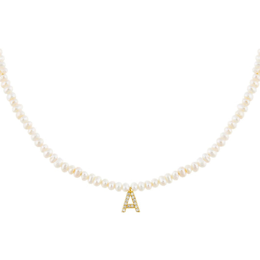 Perlų vėrinys su raide