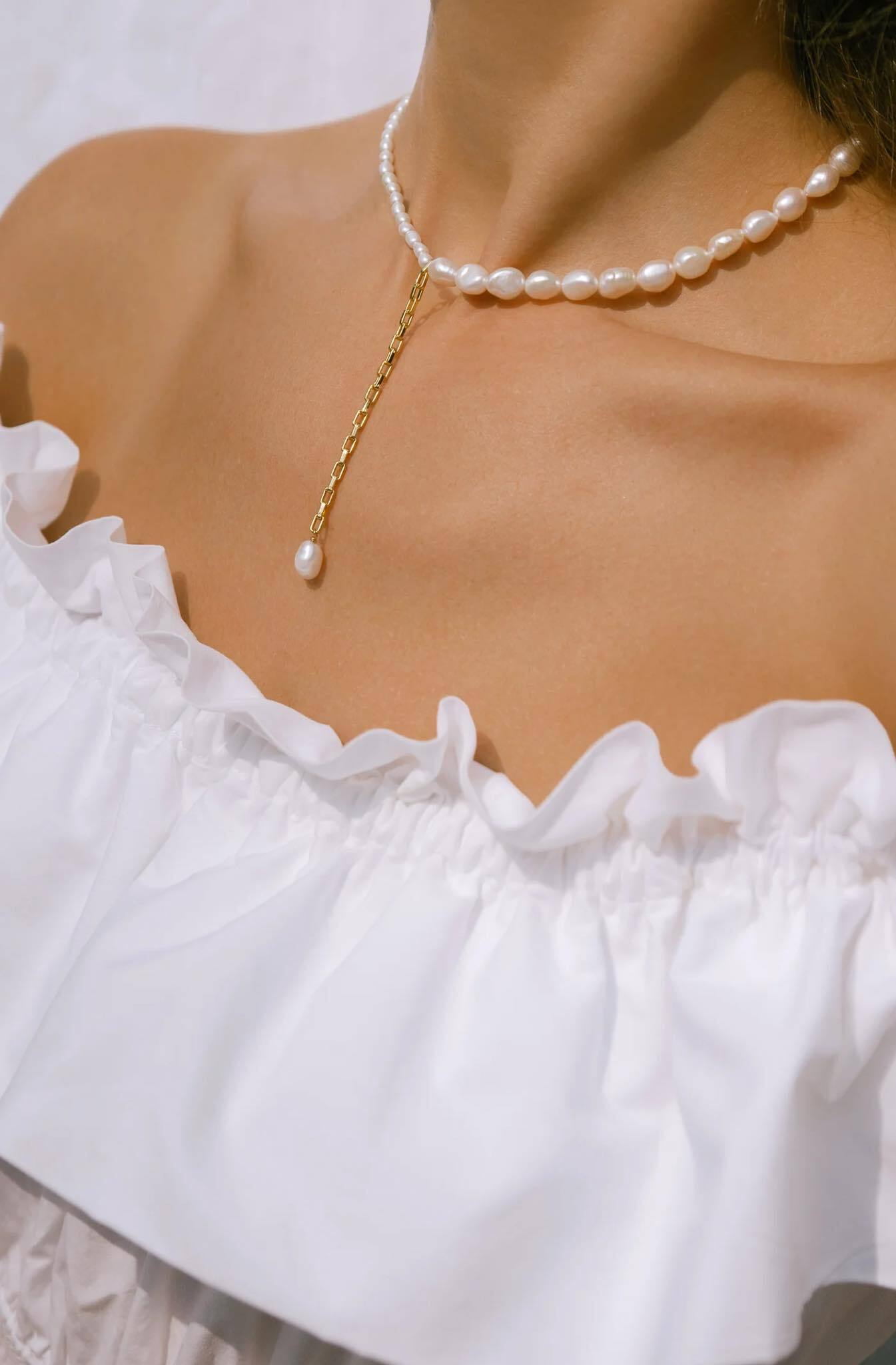 Pärlikee kullatud detailidega "Esperanza"