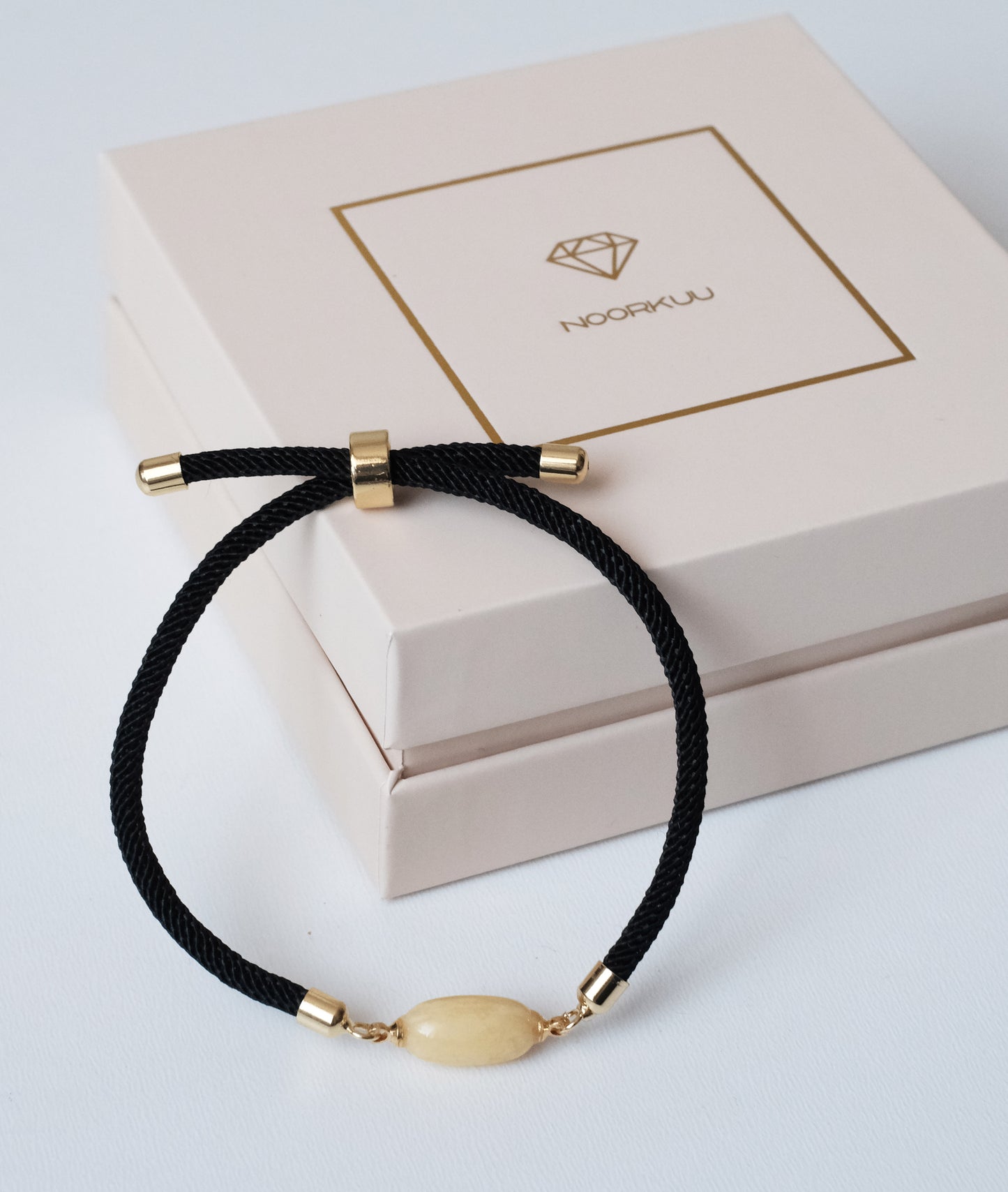 Black bracelet with natural amber