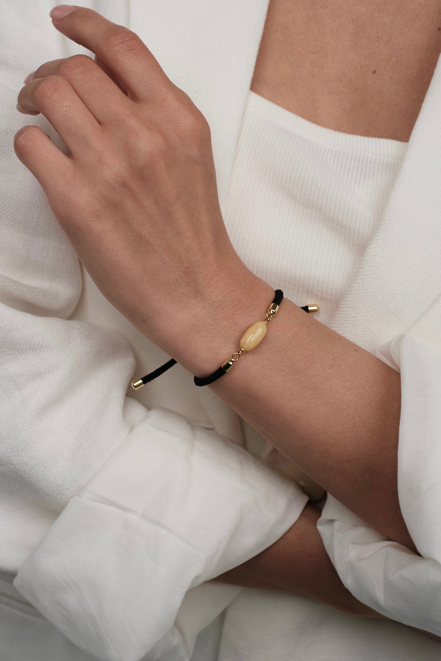 Black bracelet with natural amber
