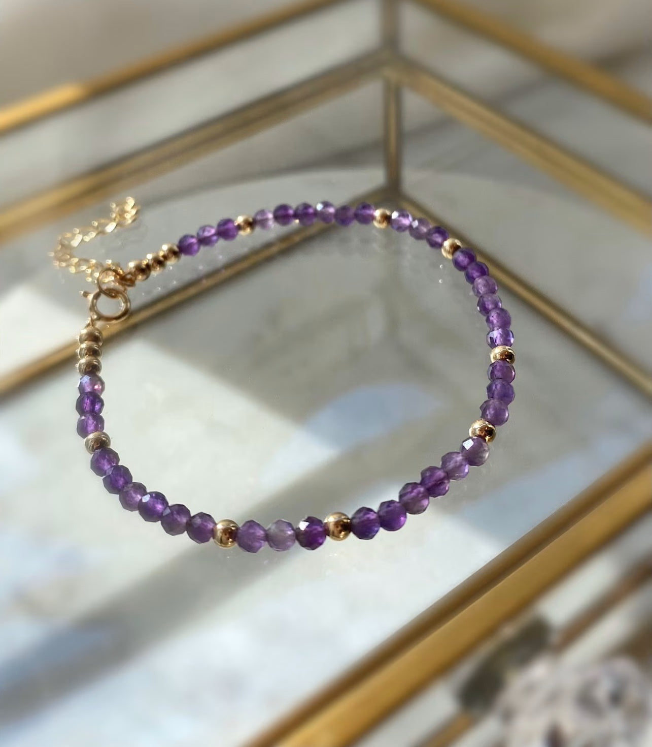 Amethyst bracelet with gold plated / silver details