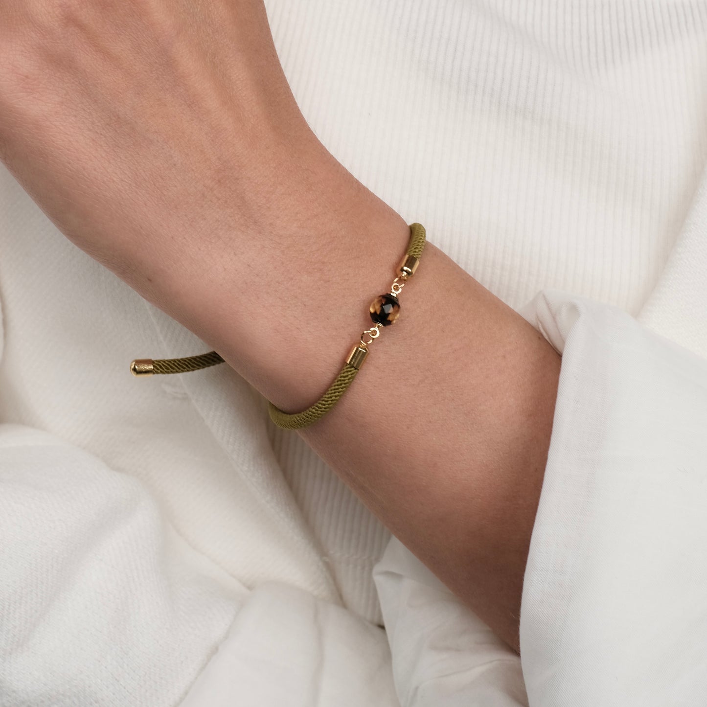 Green bracelet with natural amber