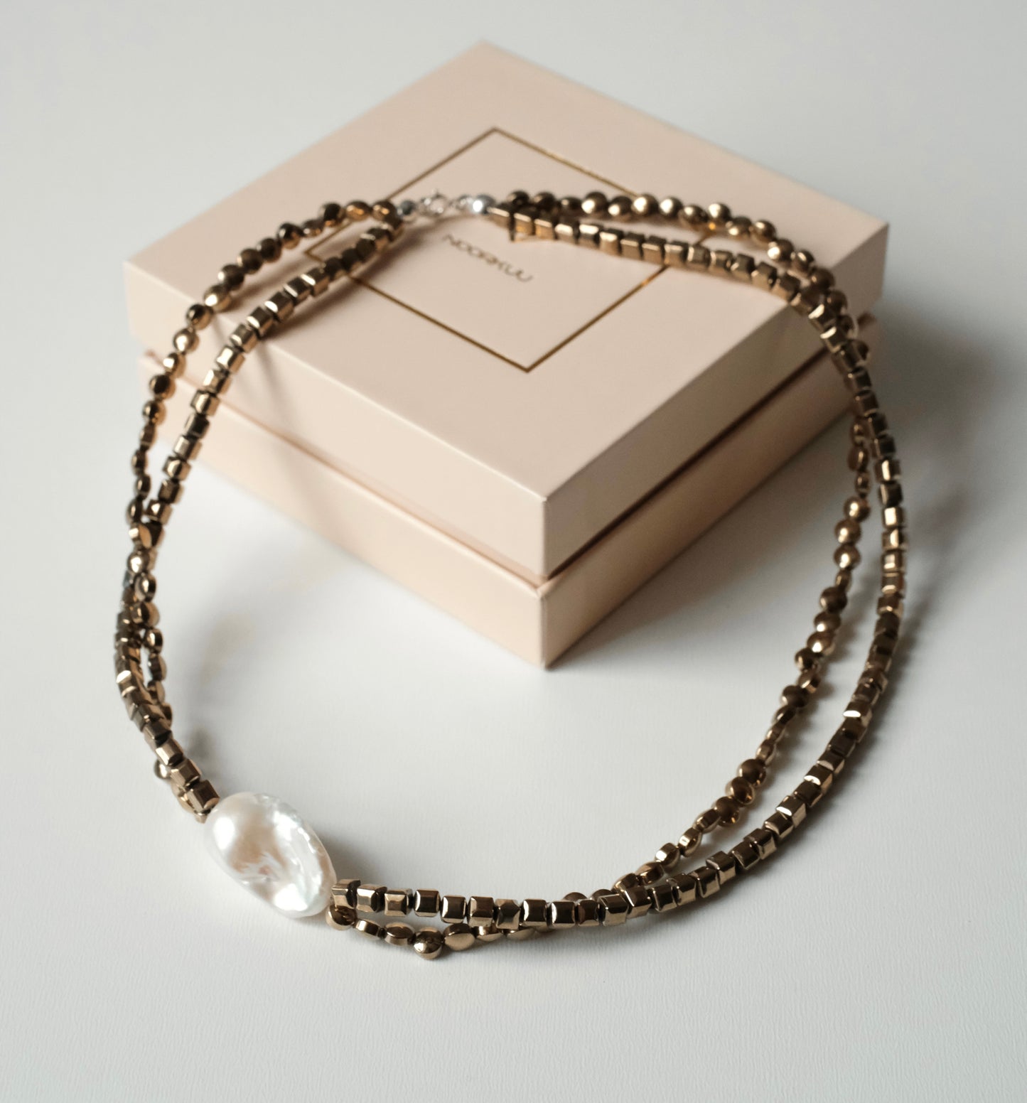 Natural pearl and hematite necklace "Double"