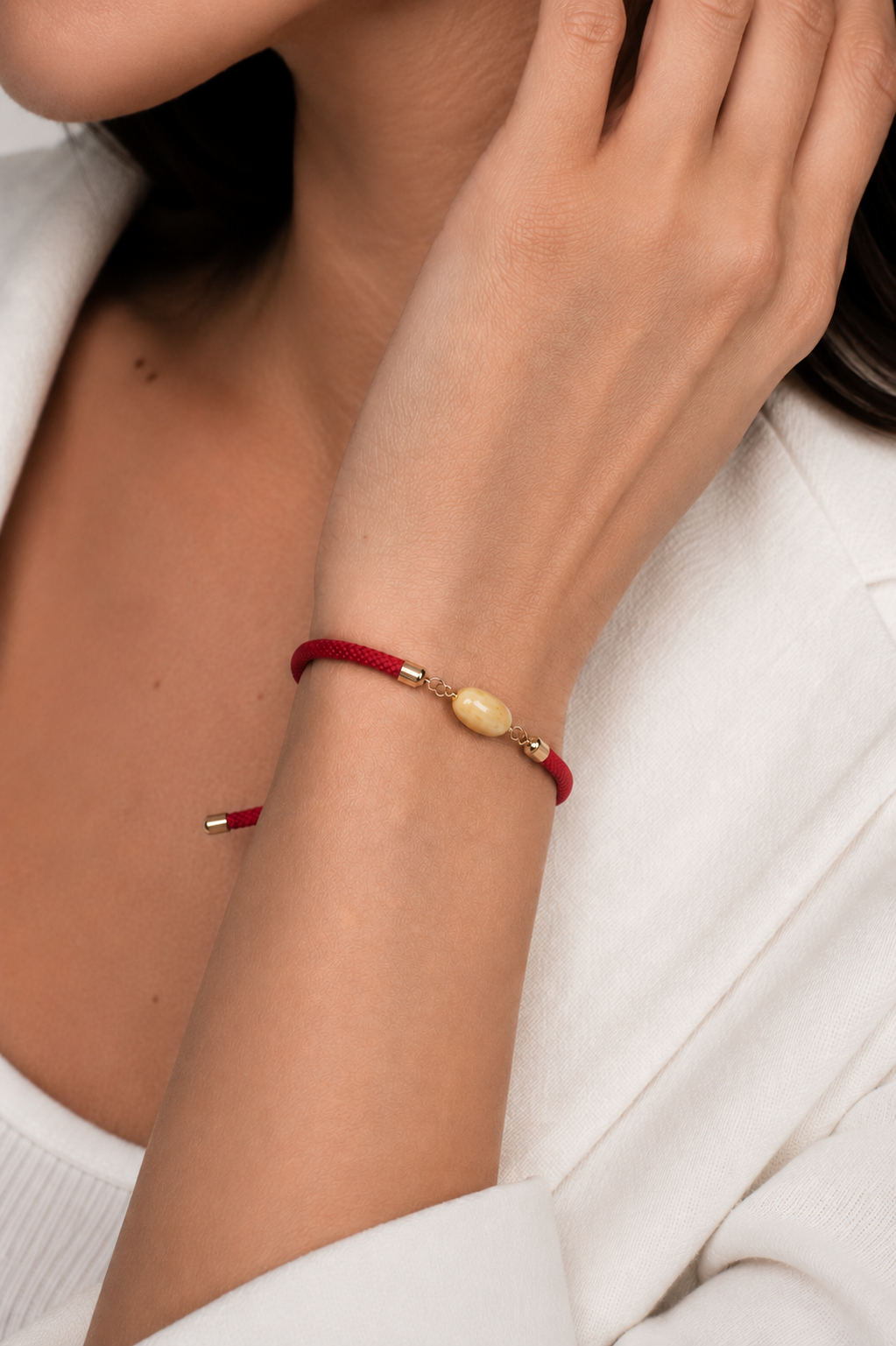 Red bracelet with natural amber