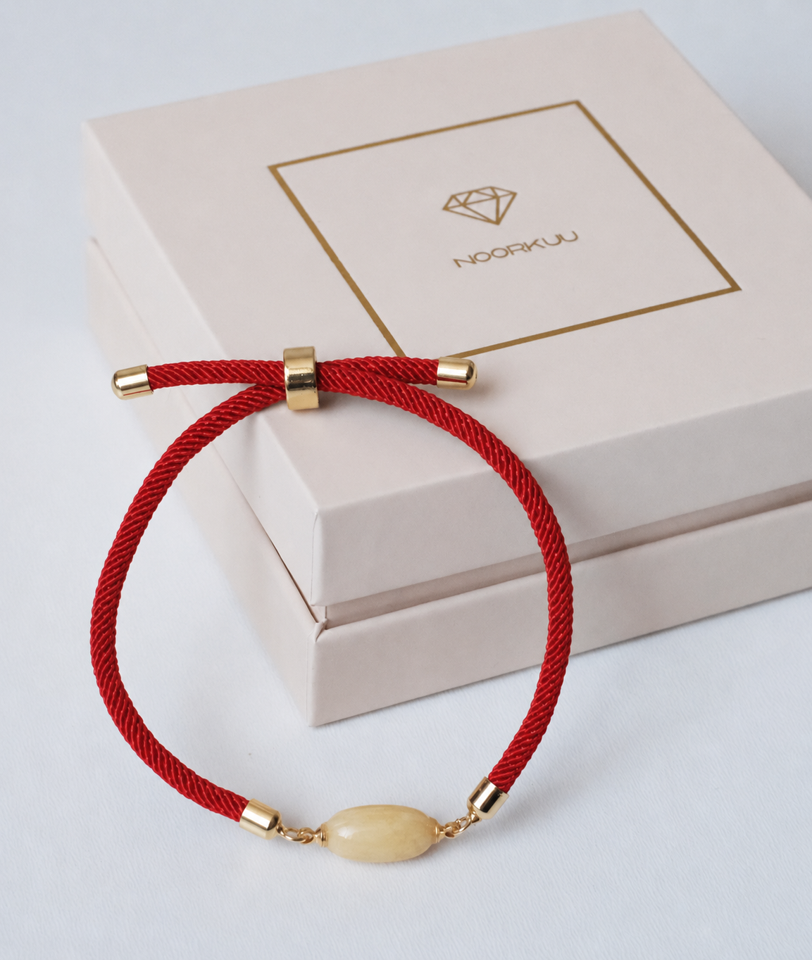 Red bracelet with natural amber