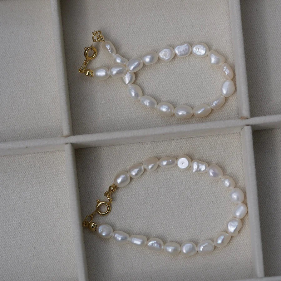 Pearl bracelet with gold plated / silver details "Marina"