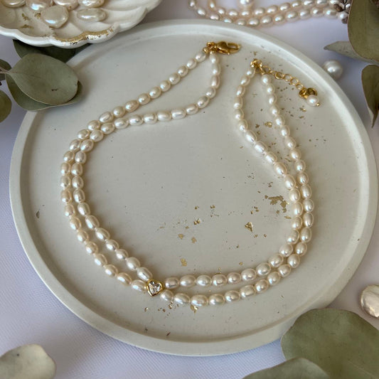 Pärlikee kullatud detailidega "Double love"