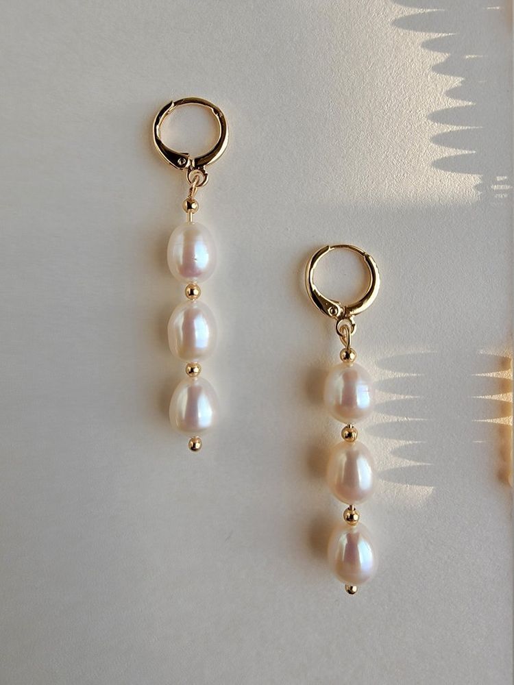 Gold plated earrings with natural pearls
