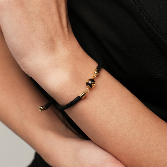 Black bracelet with natural amber