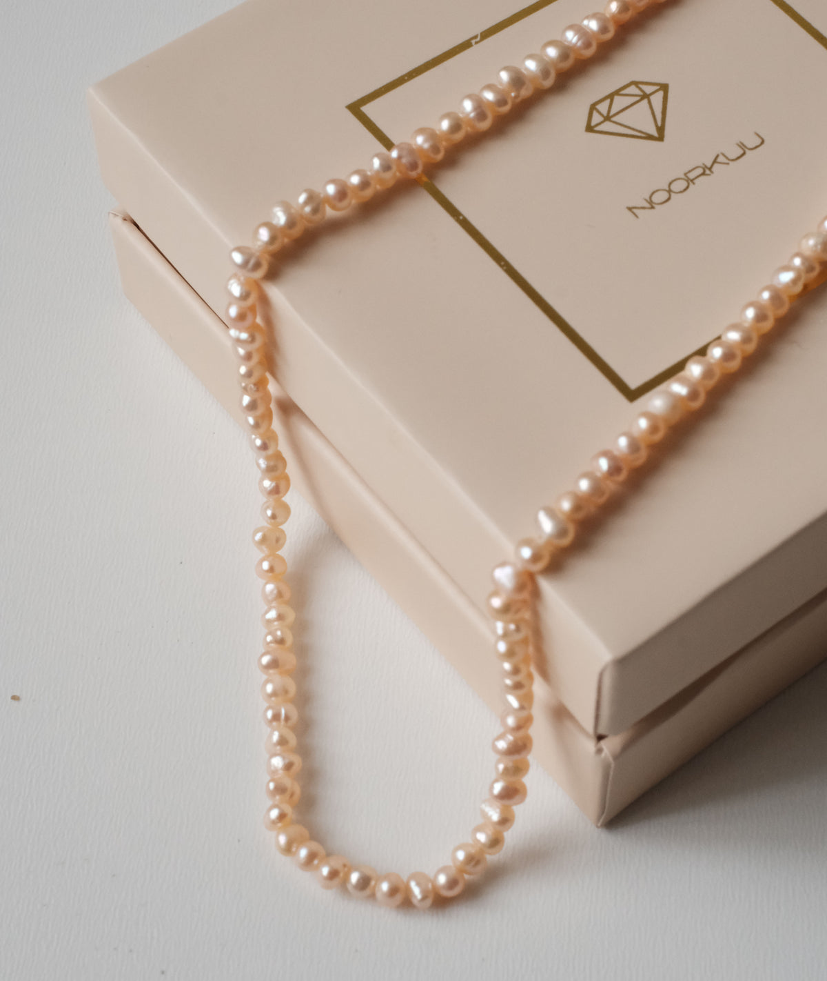 Natūralių rožinių perlų vėrinys "Peach"