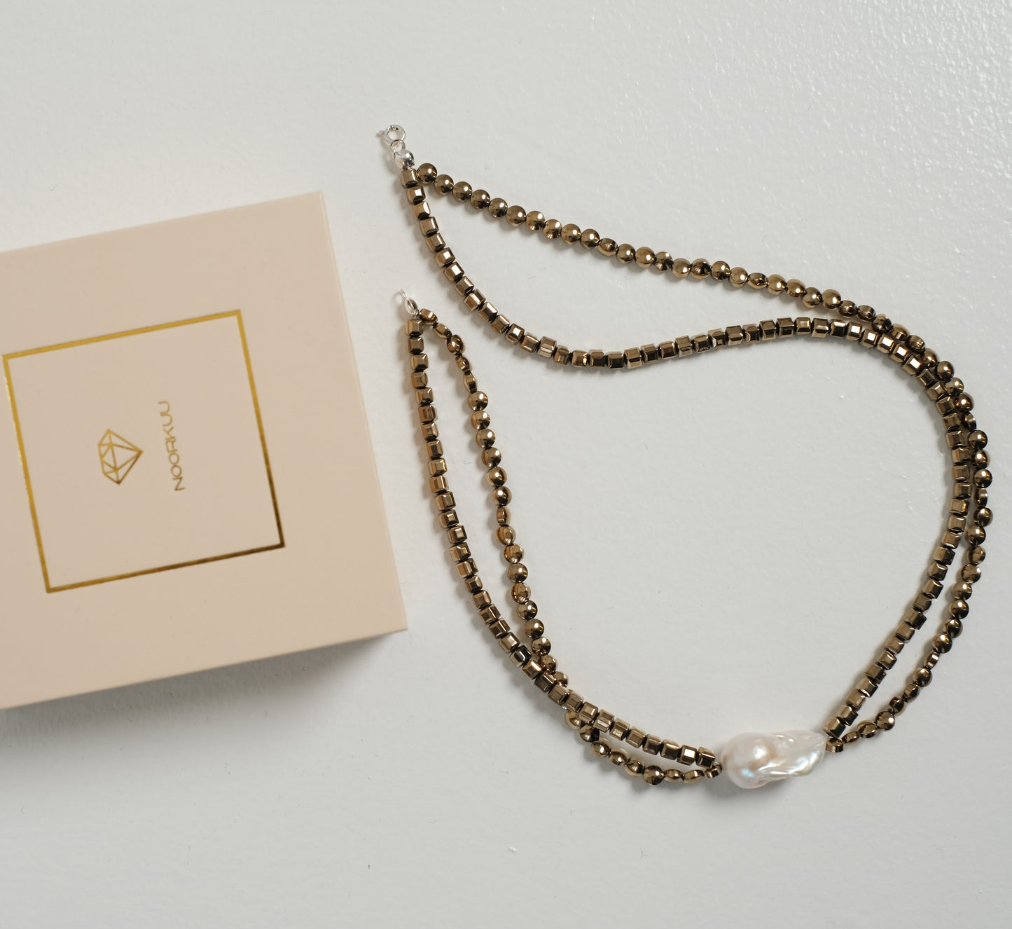 Natural pearl and hematite necklace "Double"