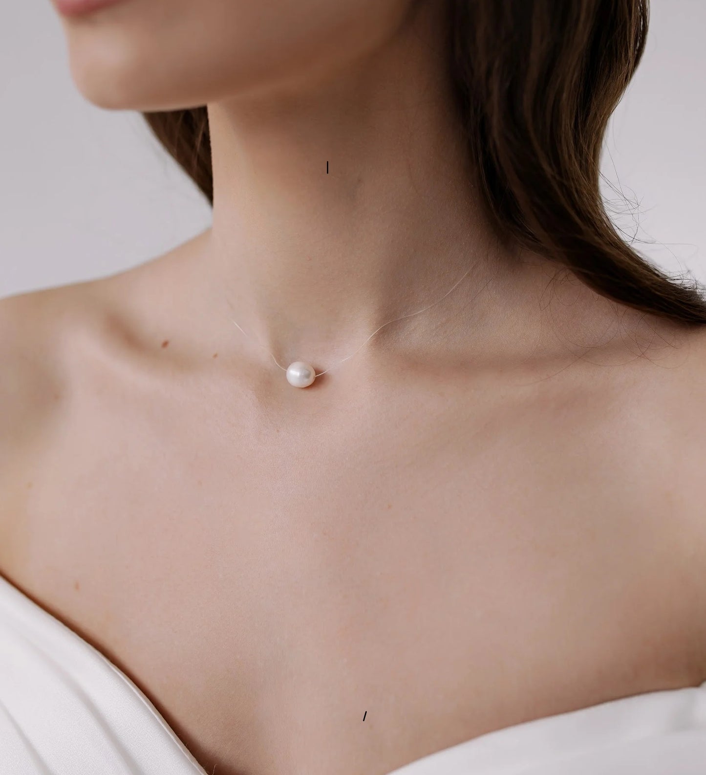 Transparent necklace with natural pearl