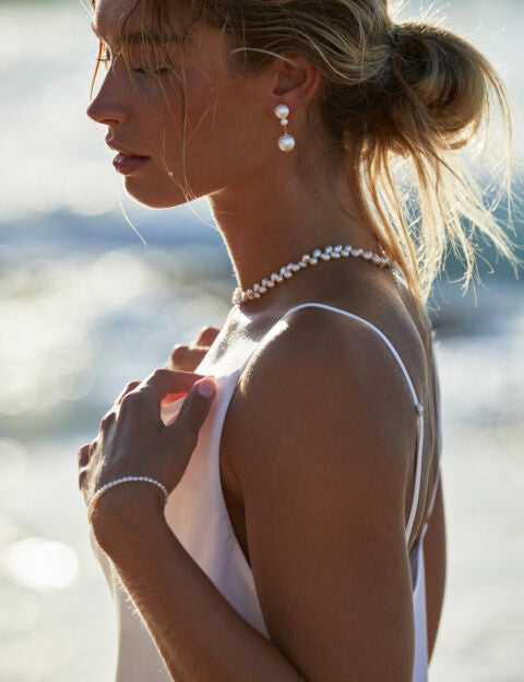 Natural pearl necklace with gold plated sterling silver details