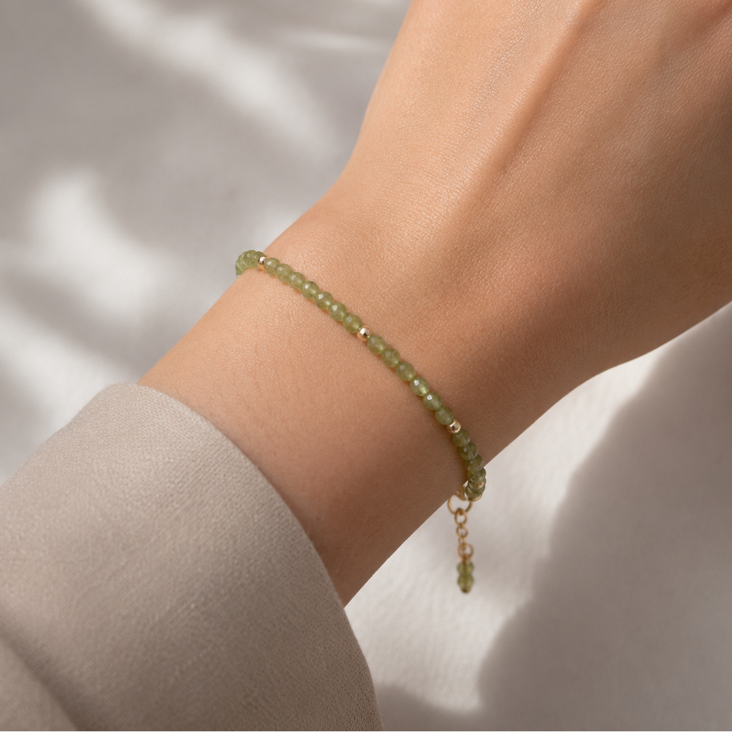Quartz bracelet with gold plated / silver details