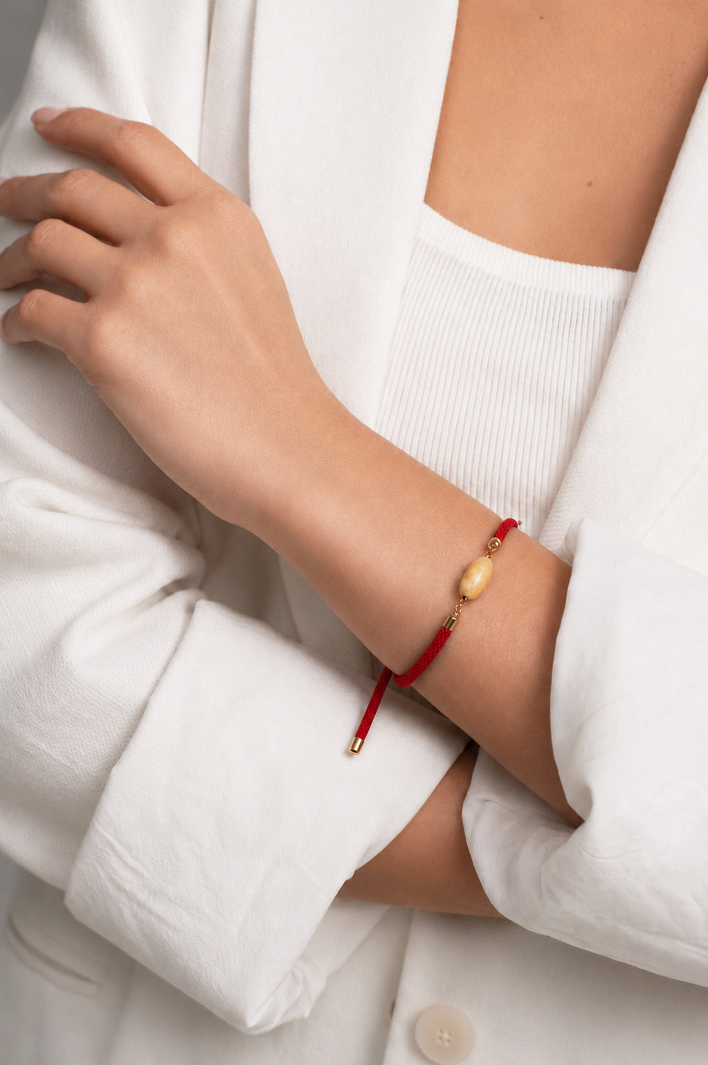 Red bracelet with natural amber
