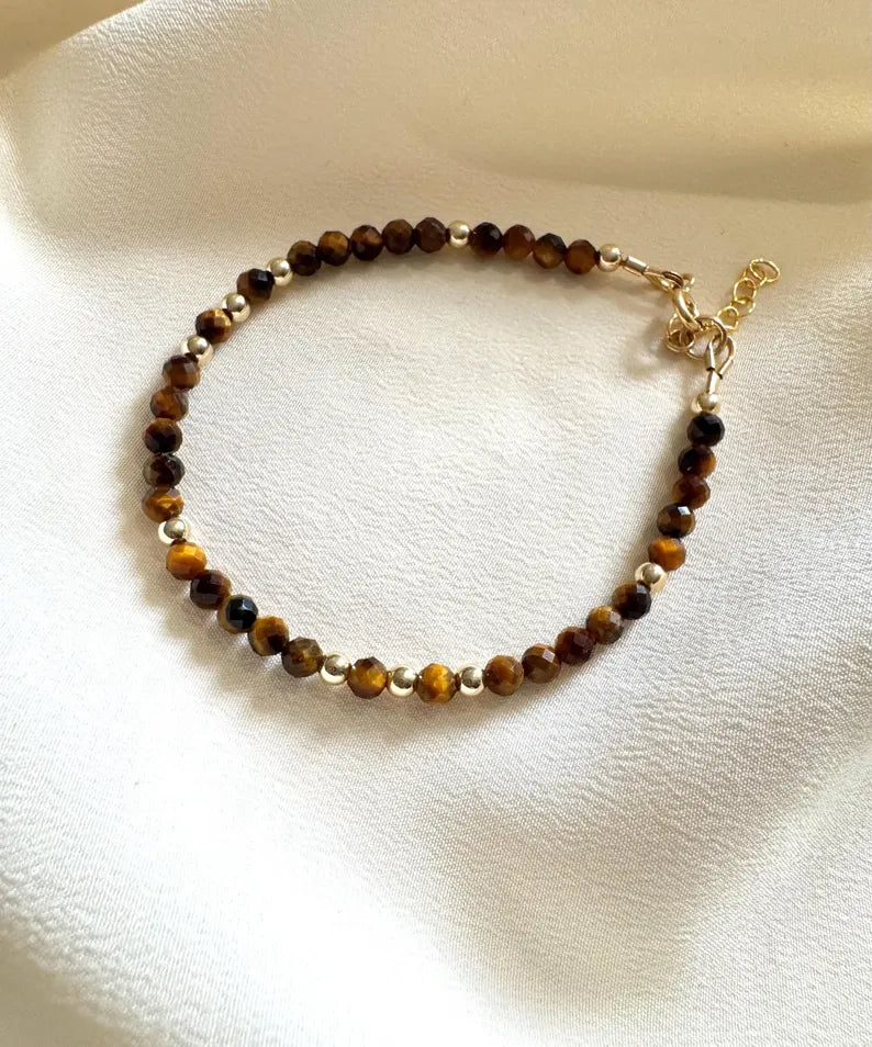 Tiger eye bracelet with gold plated / silver details