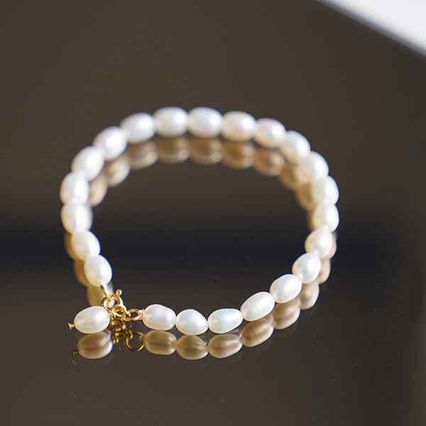 Pearl bracelet with gold plated / silver details, 7-8mm