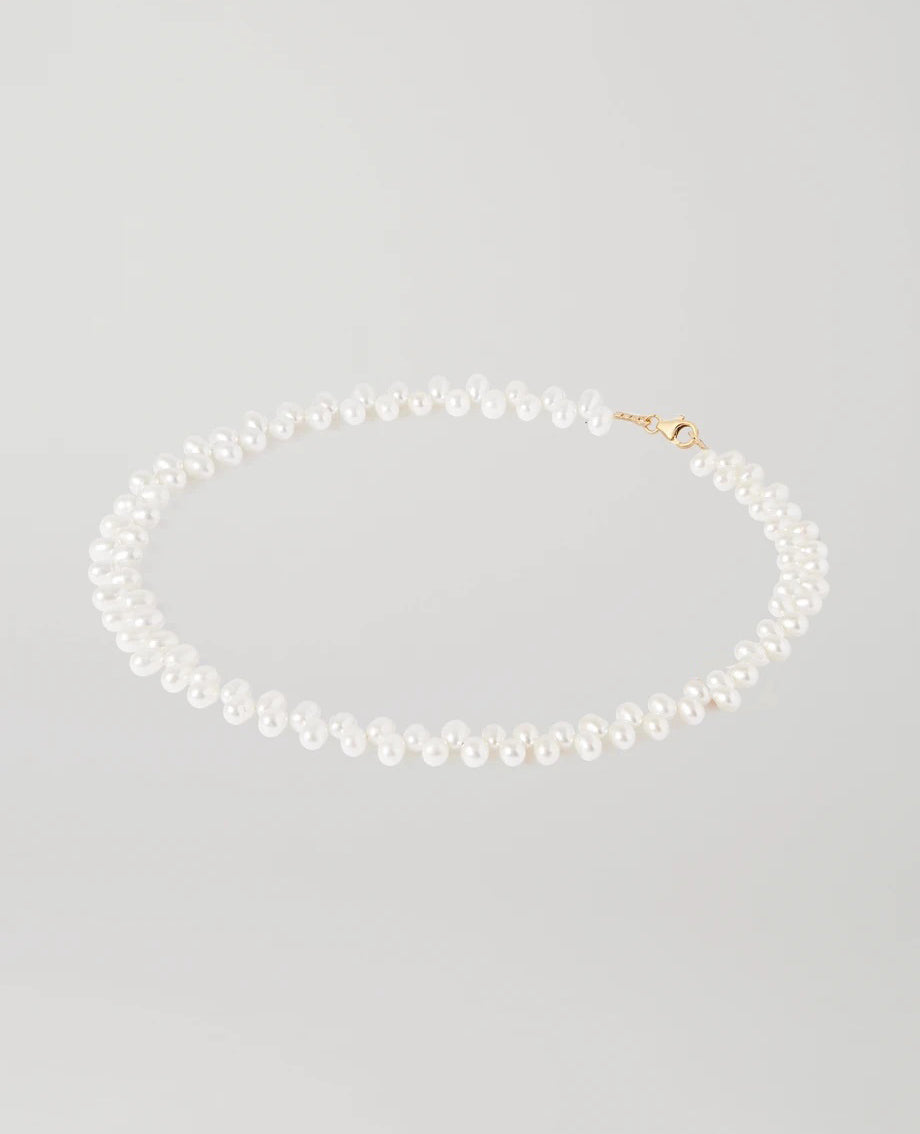 Natural pearl necklace with gold plated sterling silver details