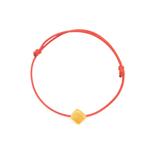 Red string bracelet with natural amber